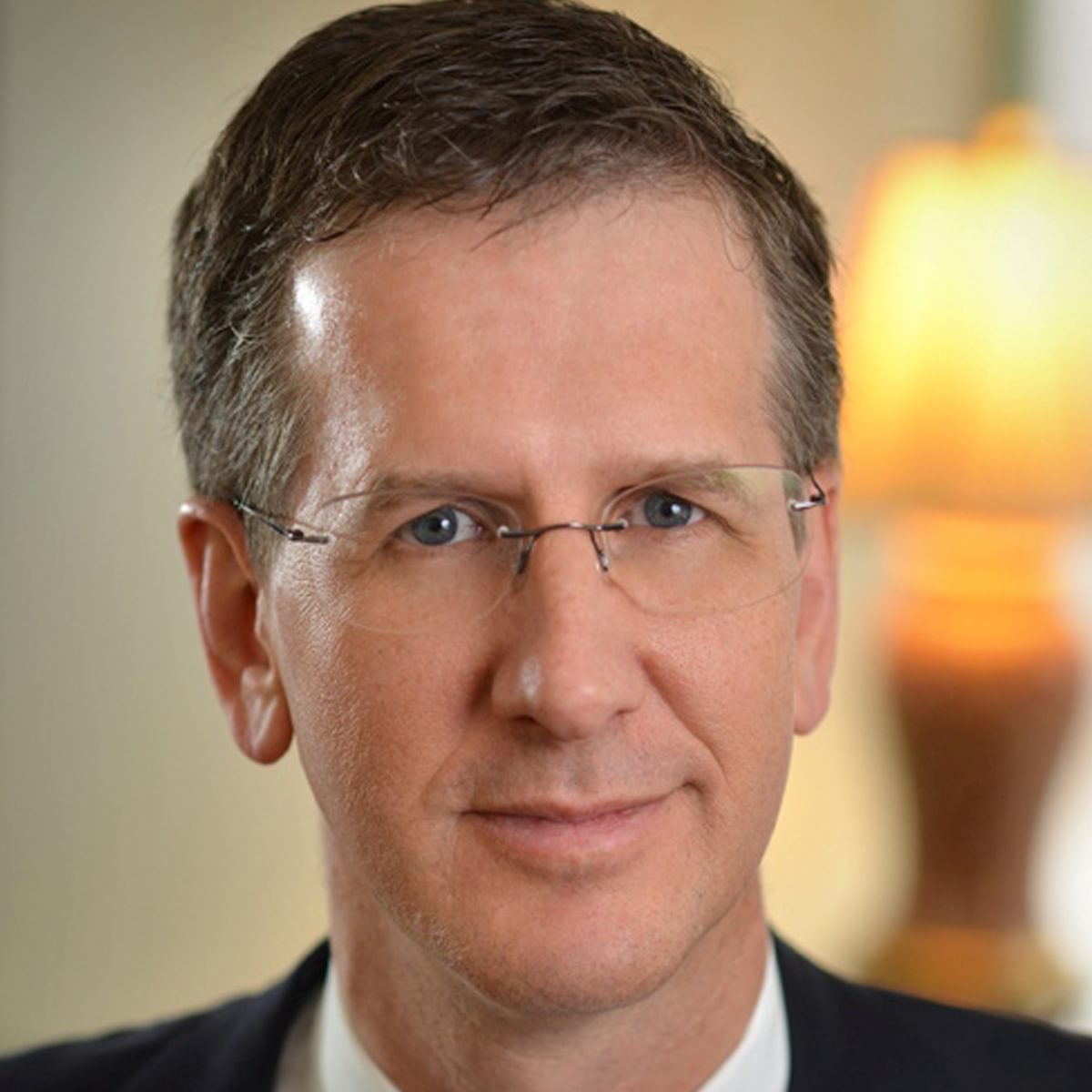 A headshot of Will Carter