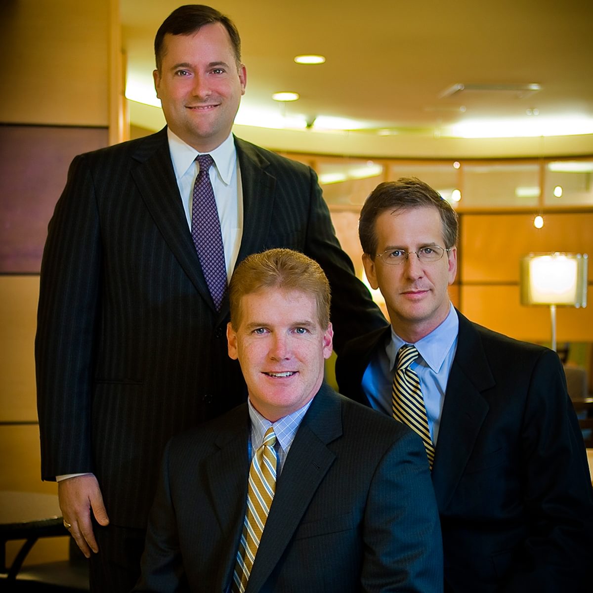 David McKinley, Will Carter and Brian Gongaware in their office.