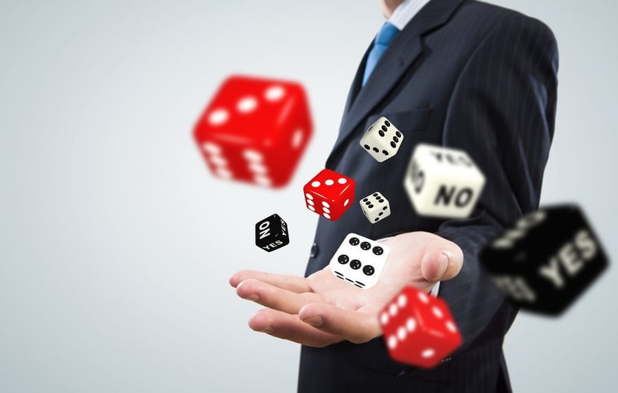 Close up of businessman throwing dice Gambling concept 1