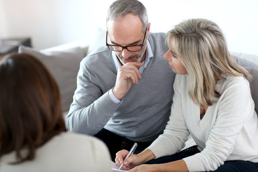Senior couple meeting financial adviser for investment 1